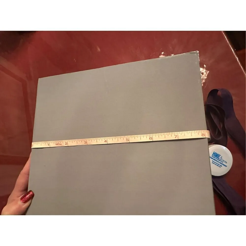 Bergdorf Goodman lavender magnetic gift box with tissue paper‎ & ribbon.